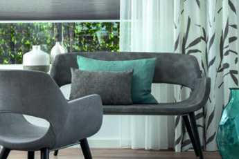 Binnenzonwering in groene kamer